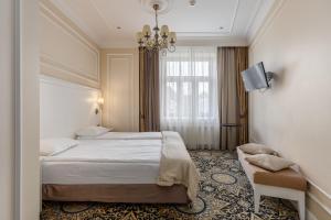 Gulta vai gultas numurā naktsmītnē Gertrude Hotel self check-in