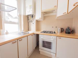 Cucina o angolo cottura di I Host Apartment - Orti 16 Scala D