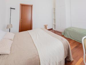 Letto o letti in una camera di I Host Apartment - Orti 16 Scala D