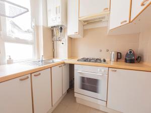 Cucina o angolo cottura di I Host Apartment - Orti 16 Scala D