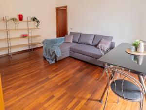 Area soggiorno di I Host Apartment - Orti 16 Scala D