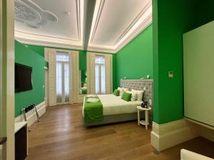Cama ou camas em um quarto em EMAJ Boutique Hotel