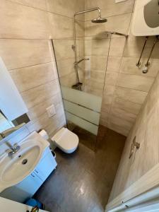 Kúpeľňa v ubytovaní Apartment Via + 26 fotografií