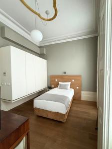 Cama ou camas em um quarto em EMAJ Boutique Hotel