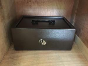 a black box sitting on top of a wooden floor at Fadine Self Catering in La Digue