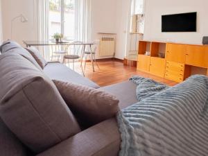 Area soggiorno di I Host Apartment - Orti 16 Scala D