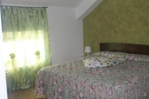 A bed or beds in a room at B&B Angels