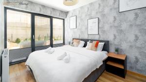 Katil atau katil-katil dalam bilik di Wonder Home- Strumykowa 7