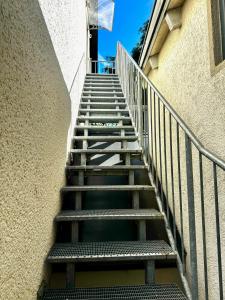 a set of stairs leading up to a building at Apartment to Düsseldorf - near Airport DUS - Trade Fair - Arena in Düsseldorf