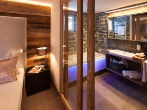 Postel nebo postele na pokoji v ubytování Boutique Hotel die Mittagspitze Superior