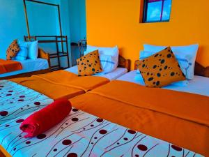 Ένα ή περισσότερα κρεβάτια σε δωμάτιο στο Awinco Haputale