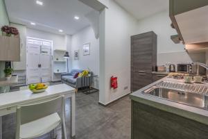 Η κουζίνα ή μικρή κουζίνα στο Spinola Bay Hideaway