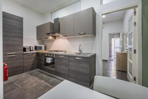 Η κουζίνα ή μικρή κουζίνα στο Spinola Bay Hideaway