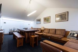 a living room with a couch and a table at Hotel Rali Viana in Viana do Castelo