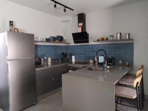 Kuchyň nebo kuchyňský kout v ubytování Casa do Favinha