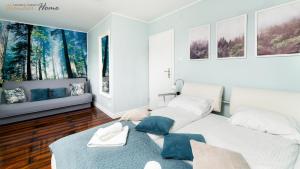 Posteľ alebo postele v izbe v ubytovaní Wonder Home - Apartamenty w cichej i zielonej części Karpacza - z miejscem na grilla i parkingiem