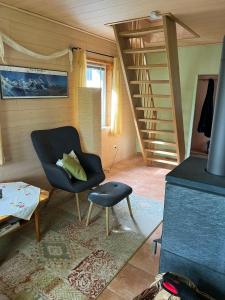 TV a/nebo společenská místnost v ubytování Idyllisches Gartenhaus