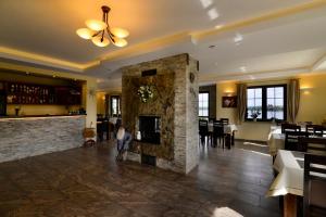 Posezení v ubytování Willa Dąbrowa