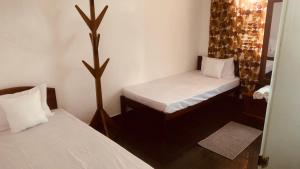 Ένα ή περισσότερα κρεβάτια σε δωμάτιο στο Elysian home villa