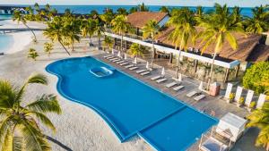 an aerial view of the resort with a swimming pool and the beach at NOOE Maldives Kunaavashi - Stay 5 nights or more and get Free Round Trip Speedboat and Free One time Floating Breakfast for Bookings in Water Villas, valid till 31st October 2026 in Fulidhoo