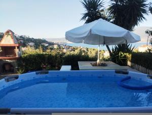 The swimming pool at or close to Villa Karmelina Flat