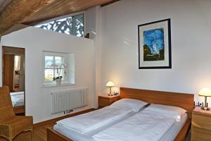 Postel nebo postele na pokoji v ubytování Villa Lageder