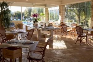 Reštaurácia alebo iné gastronomické zariadenie v ubytovaní Masseria Torre Del Diamante