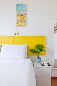 A bed or beds in a room at Superior Relais FCollection Temple View