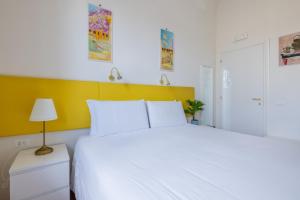 A bed or beds in a room at Superior Relais FCollection Temple View