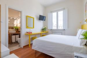 A bed or beds in a room at Superior Relais FCollection Temple View
