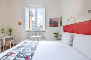 A bed or beds in a room at Superior Relais FCollection Temple View