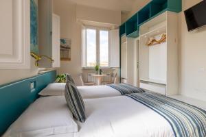 A bed or beds in a room at Superior Relais FCollection Temple View