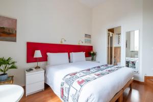 A bed or beds in a room at Superior Relais FCollection Temple View