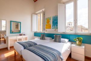 A bed or beds in a room at Superior Relais FCollection Temple View