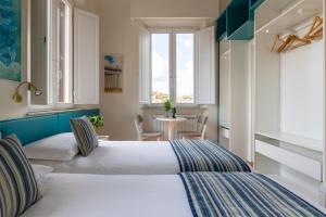 A bed or beds in a room at Superior Relais FCollection Temple View