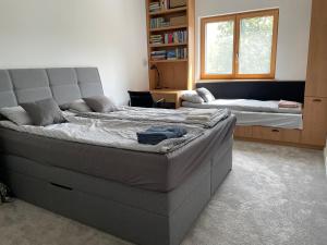 Postel nebo postele na pokoji v ubytování Bert apartman