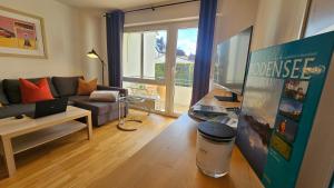 TV a/nebo společenská místnost v ubytování Relax am Bodensee