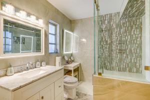 a bathroom with a sink and a shower and a toilet at Spacious Plant City Home 1 Mi to Dtwn in Plant City +30 photos