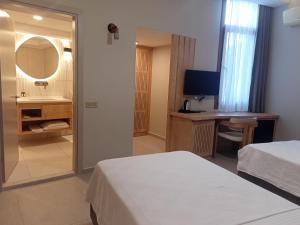 Postel nebo postele na pokoji v ubytování Casalita Hotel