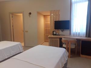 Postel nebo postele na pokoji v ubytování Casalita Hotel