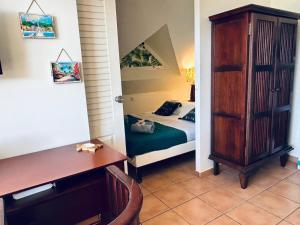 Postelja oz. postelje v sobi nastanitve TI COCOTIER Appartement VUE MER 2 à 6 personnes village Pierre et vacances