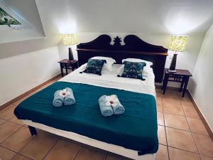 Postelja oz. postelje v sobi nastanitve TI COCOTIER Appartement VUE MER 2 à 6 personnes village Pierre et vacances