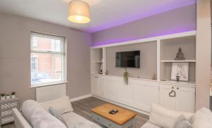 Et tv og/eller underholdning på Number 3 Castle Cottage + 4 billeder