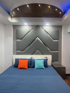 Postel nebo postele na pokoji v ubytování Rooftop Rooms