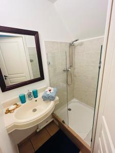 Kopalnica v nastanitvi TI COCOTIER Appartement VUE MER 2 à 6 personnes village Pierre et vacances