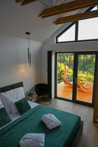 Postel nebo postele na pokoji v ubytování Mátra Forest Resort