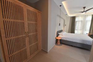 Postel nebo postele na pokoji v ubytování Casalita Hotel