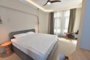 Postel nebo postele na pokoji v ubytování Casalita Hotel