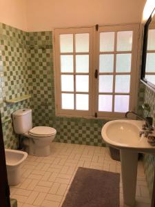 Ένα μπάνιο στο Between us : Chambres d’hôtes à Saint joseph