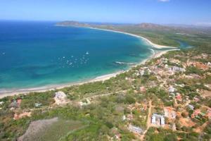 an aerial view of a beach and the ocean at Hotel Trianon in San José